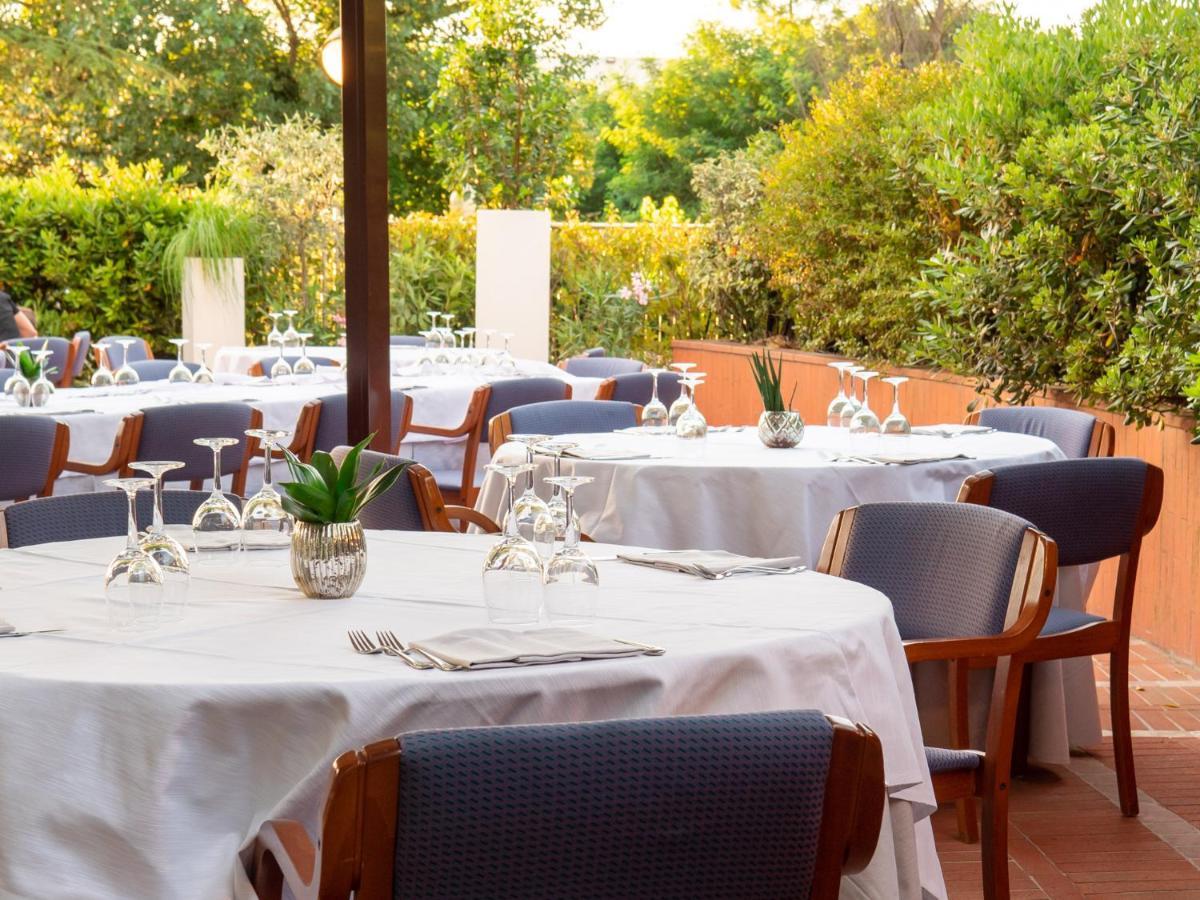 Hotel Minerva Arezzo Bagian luar foto