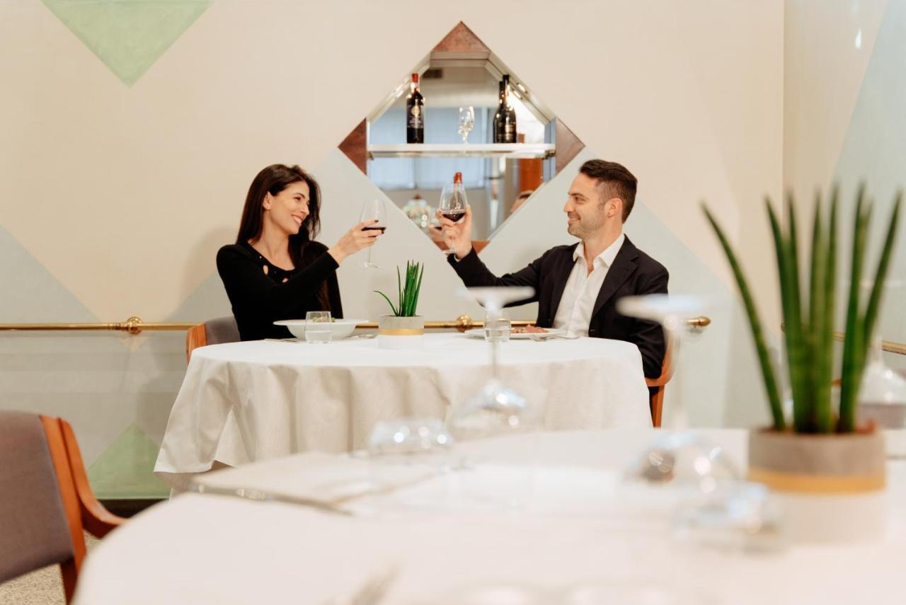 Hotel Minerva Arezzo Bagian luar foto