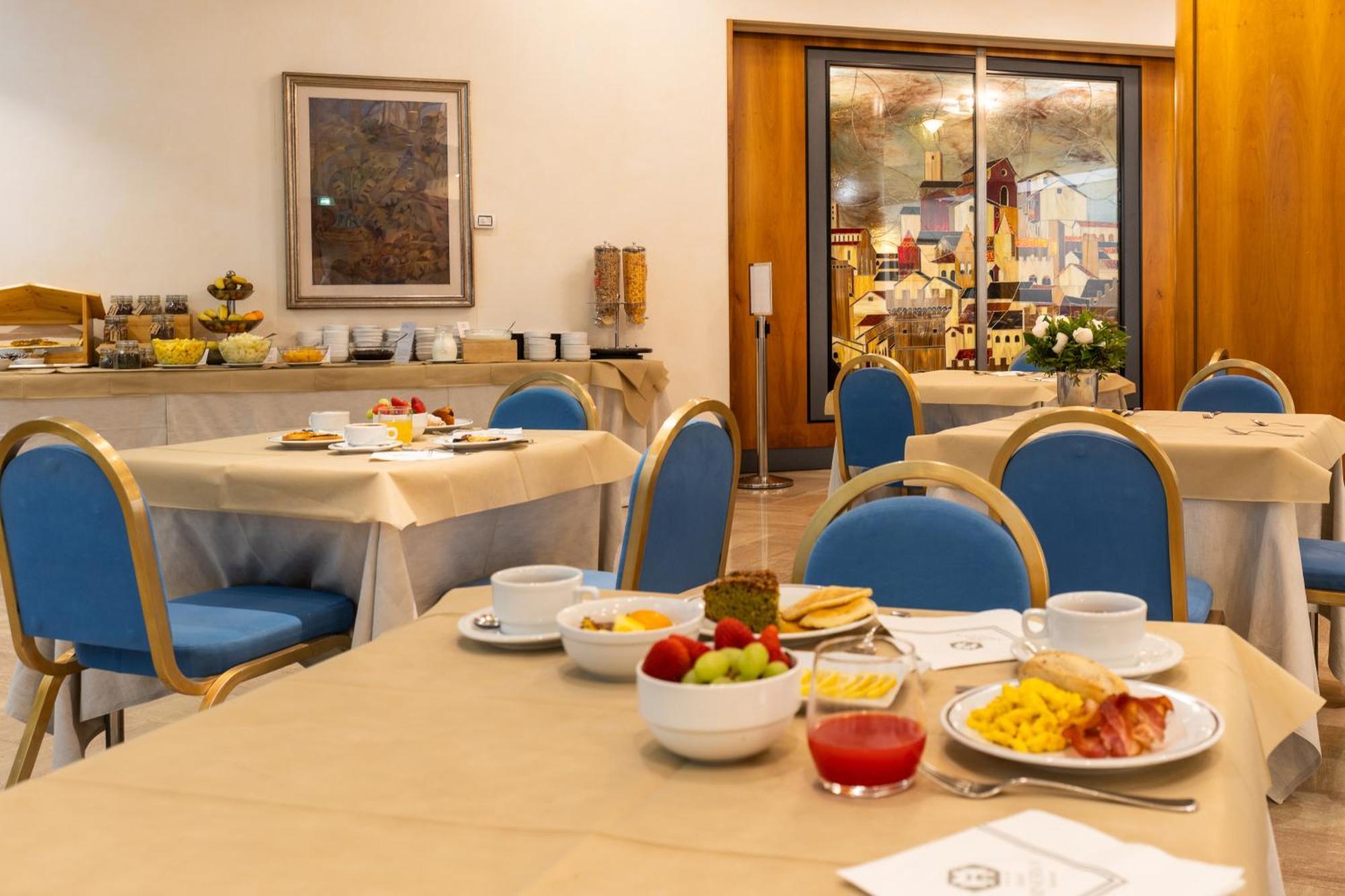 Hotel Minerva Arezzo Bagian luar foto
